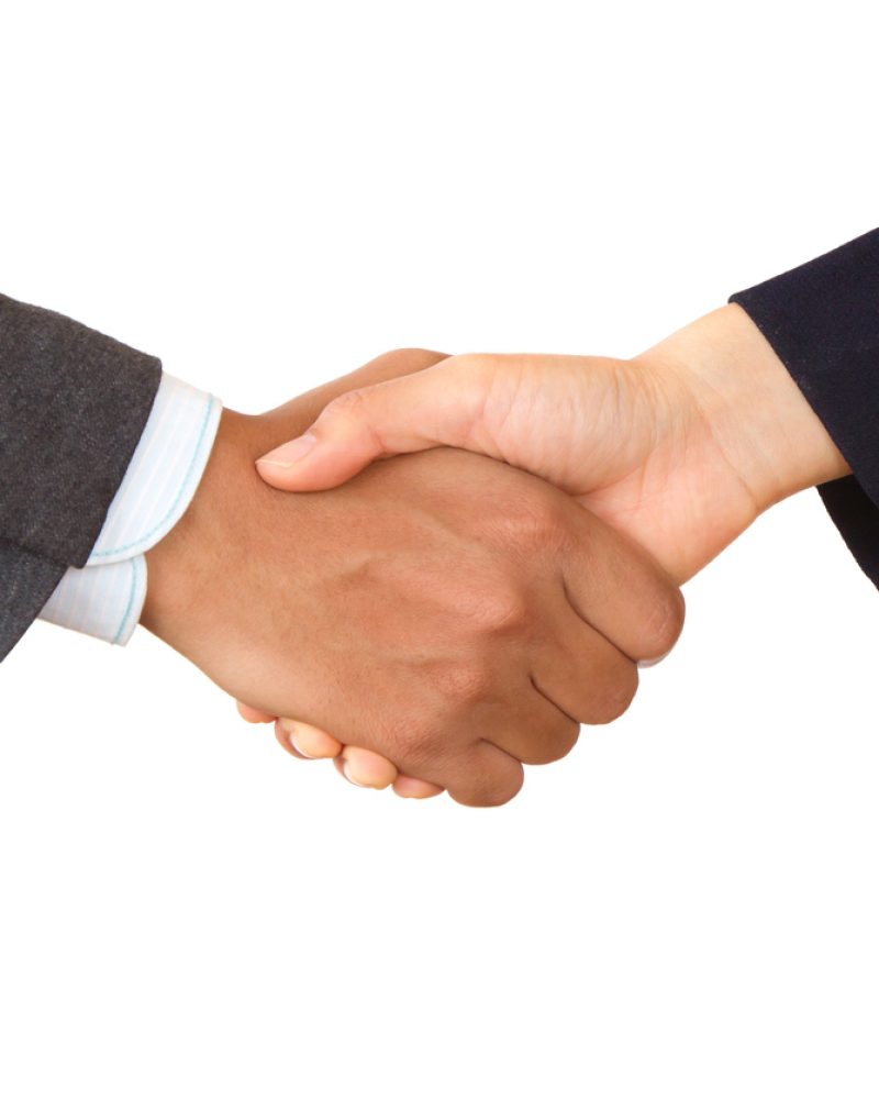 Business Handshake of unrecognized company, isolated white background